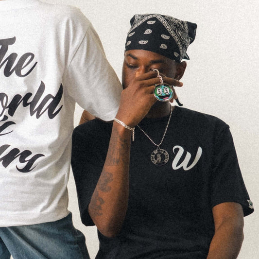 Wavy World Keychain from Drop 1 – Hip Hop & Cereal, Held with a street-style fit, adding a pop of play to your everyday Fit.